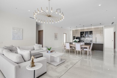 This exceptional just-completed penthouse at Aria offers a rare