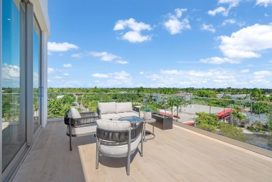 This exceptional just-completed penthouse at Aria offers a rare