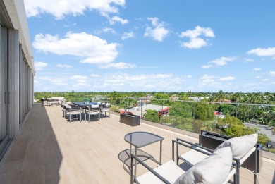 This exceptional just-completed penthouse at Aria offers a rare