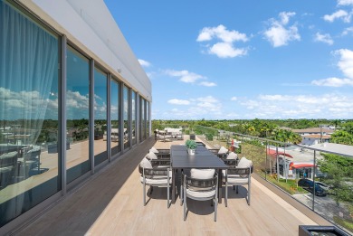 This exceptional just-completed penthouse at Aria offers a rare