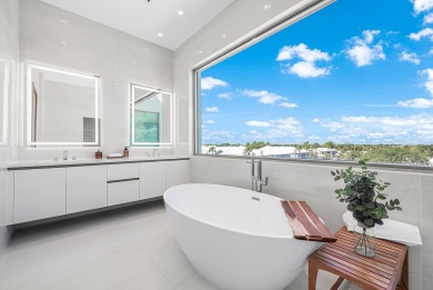 This exceptional just-completed penthouse at Aria offers a rare