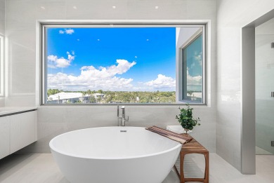 This exceptional just-completed penthouse at Aria offers a rare