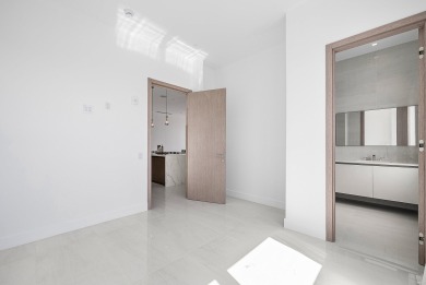 This exceptional just-completed penthouse at Aria offers a rare