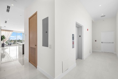 This exceptional just-completed penthouse at Aria offers a rare