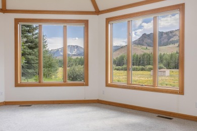 Stunning custom mountain home featuring unobscured Bald Mountain