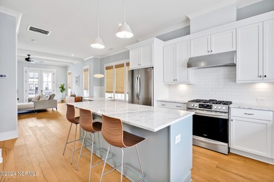 Welcome to an exquisite PBC designed townhome nestled in the