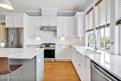 Welcome to an exquisite PBC designed townhome nestled in the