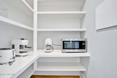 Welcome to an exquisite PBC designed townhome nestled in the