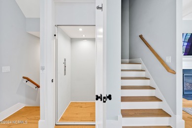 Welcome to an exquisite PBC designed townhome nestled in the