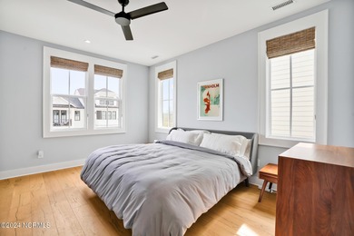 Welcome to an exquisite PBC designed townhome nestled in the