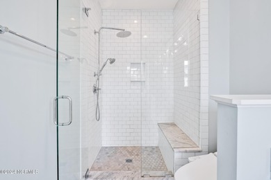 Welcome to an exquisite PBC designed townhome nestled in the