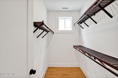 Welcome to an exquisite PBC designed townhome nestled in the