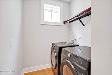 Welcome to an exquisite PBC designed townhome nestled in the