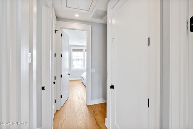 Welcome to an exquisite PBC designed townhome nestled in the