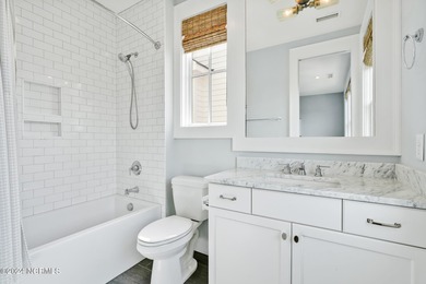 Welcome to an exquisite PBC designed townhome nestled in the