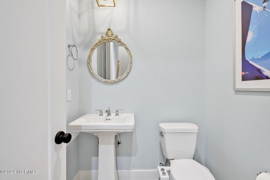 Welcome to an exquisite PBC designed townhome nestled in the