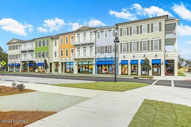 Welcome to an exquisite PBC designed townhome nestled in the