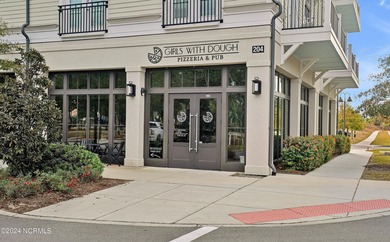 Welcome to an exquisite PBC designed townhome nestled in the