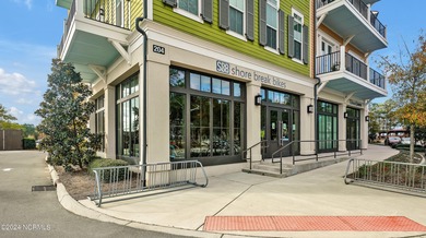 Welcome to an exquisite PBC designed townhome nestled in the