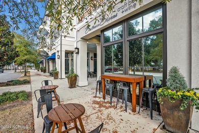 Welcome to an exquisite PBC designed townhome nestled in the