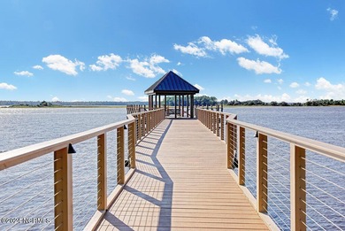 Welcome to an exquisite PBC designed townhome nestled in the