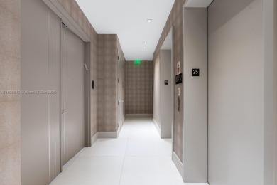 Experience oceanfront luxury living at its finest in this