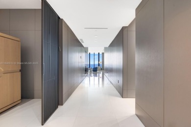 Experience oceanfront luxury living at its finest in this