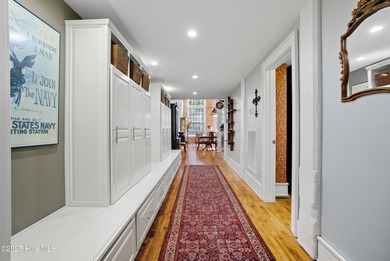 This desirable corner unit in the acclaimed renovation of the