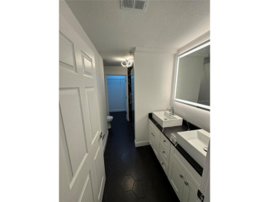 This condo was recently remodeled in a Tampa Bay Lightning theme