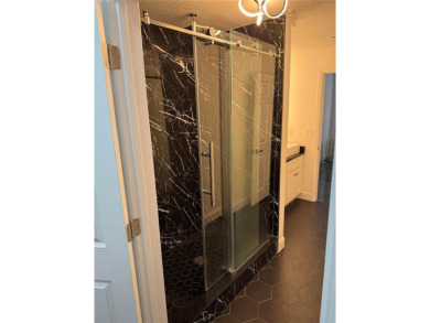 This condo was recently remodeled in a Tampa Bay Lightning theme