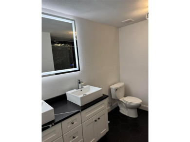 This condo was recently remodeled in a Tampa Bay Lightning theme