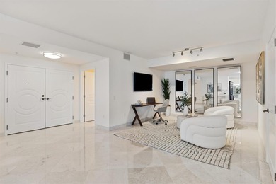 Experience luxury beachfront living in this oceanfront