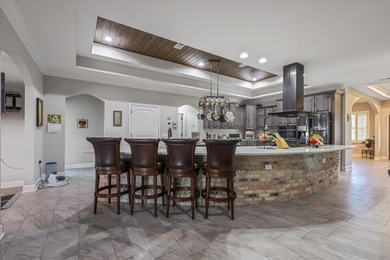 Experience exceptional craftsmanship in this custom-built home