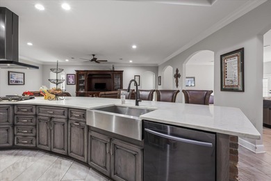 Experience exceptional craftsmanship in this custom-built home