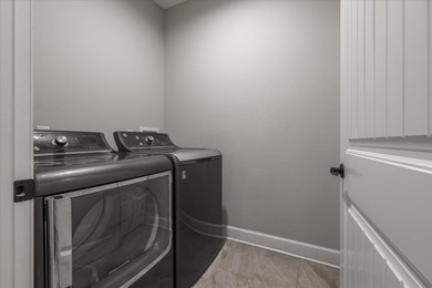 Experience exceptional craftsmanship in this custom-built home