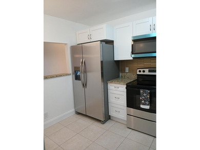 Penthouse end unit condo newly renovated with brand new kitchen
