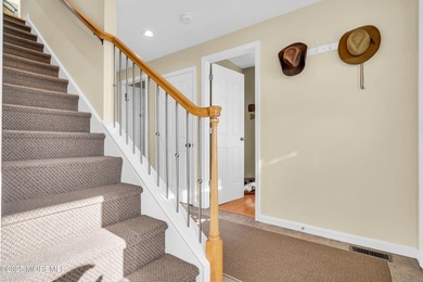 Enjoy water views from every window in this beautifully crafted