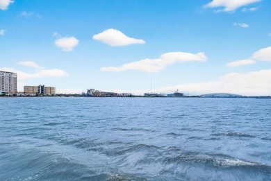 Luxury Riverfront Condominium with Stunning Views & High-End