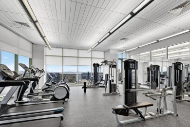 Luxury Riverfront Condominium with Stunning Views & High-End