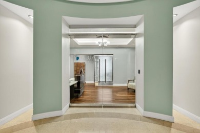 Luxury Riverfront Condominium with Stunning Views & High-End