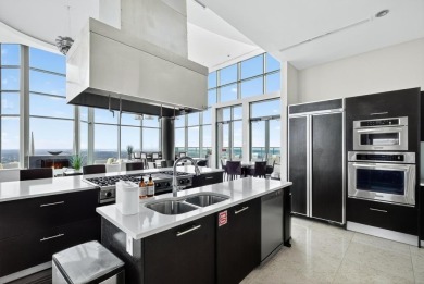 Luxury Riverfront Condominium with Stunning Views & High-End