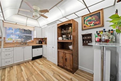 This beautifully renovated 2-bedroom, 2-bathroom condo in the