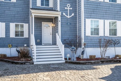 Welcome to your dream coastal retreat, just a few houses from