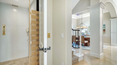 Experience elevated coastal living in this updated, elegantly