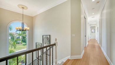 Experience elevated coastal living in this updated, elegantly