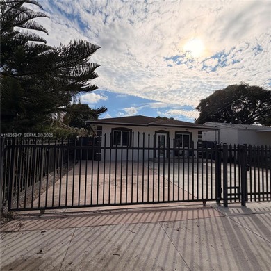 Charming home featuring an updated kitchen, impact windows