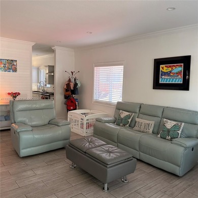 Charming home featuring an updated kitchen, impact windows