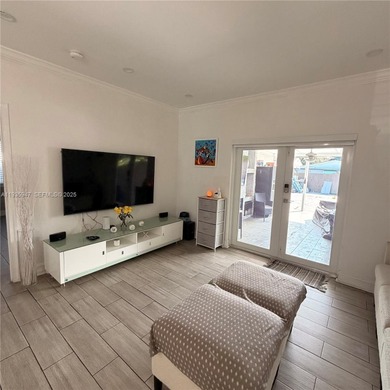 Charming home featuring an updated kitchen, impact windows