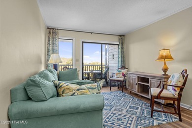 Step into island living w this 3 BR, 2.5 BA condo nestled under