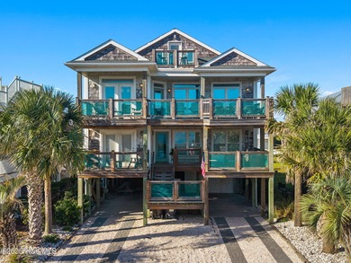 Beautifully updated coastal retreat just steps from the beach